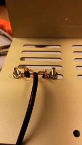 Details of socket mounted in ventilation slot.