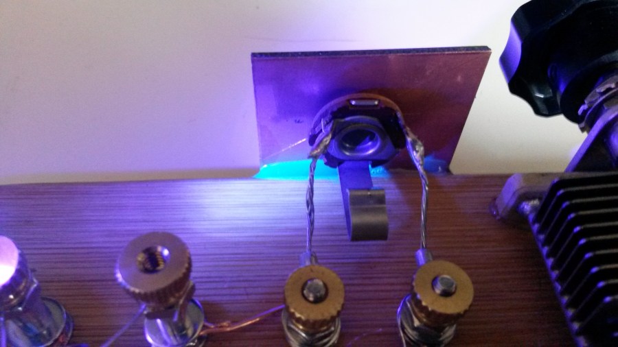 Front panel attched with UV glue (Fluorescing)