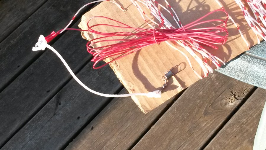 Top corner of the loop showing ring terminal crimped in place.