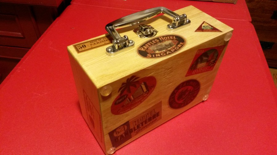 Wooden box with travel decals