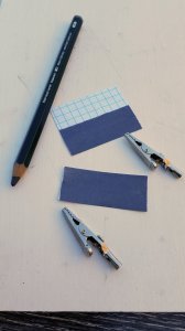 Graphite covered index card pieces, ready for parallel hookup